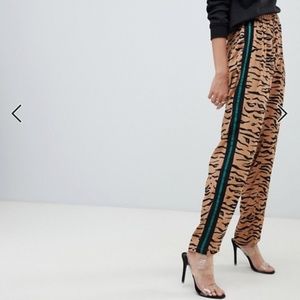 NA-KD Tiger Print Stripe Track Pants